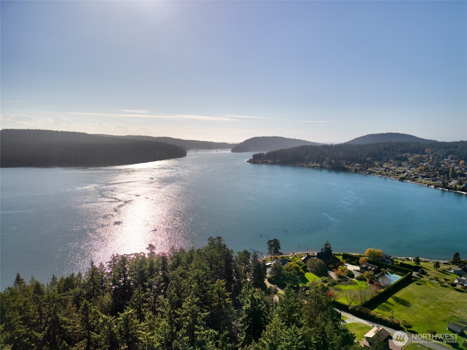 6860 Salmon Beach Road Anacortes, WA 98221 - Photo 24 of 40 a view of a lake in a field