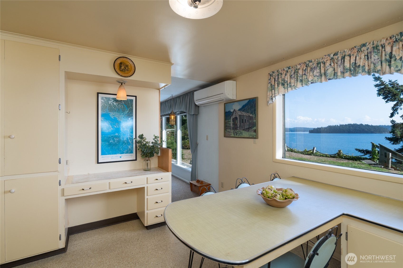 6860 Salmon Beach Road Anacortes, WA 98221 - Photo 29 of 39 a view of a dining room with furniture and window