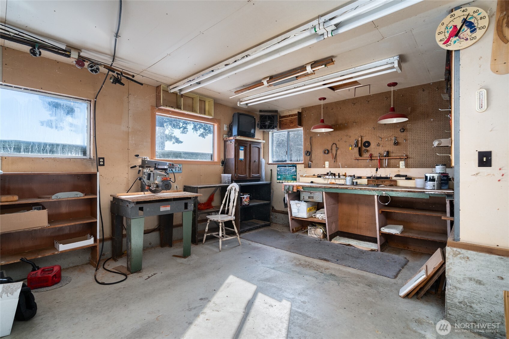 6860 Salmon Beach Road Anacortes, WA 98221 - Photo 39 of 39 a view of a dining area with furniture and a window