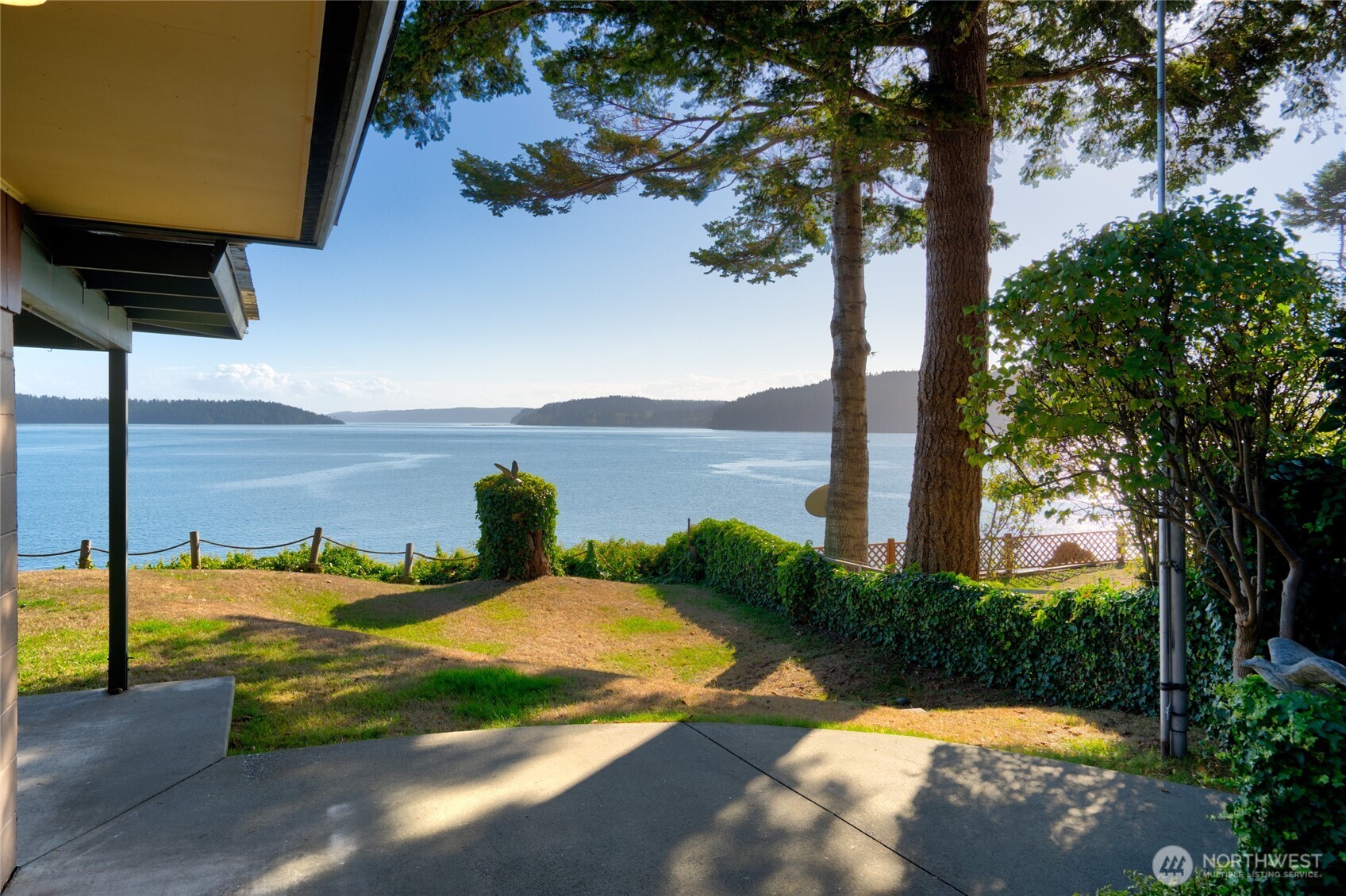 6860 Salmon Beach Road Anacortes, WA 98221 - Photo 10 of 40 a view of a swimming pool with a backyard