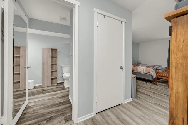 a en suite bathroom with a sink and a toilet
