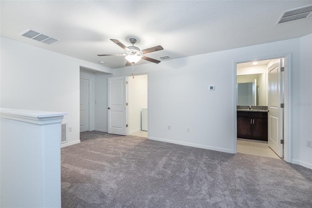 14348 Editors Note Street Ruskin, FL 33573 - Photo 12 of 24 wooden floor in an empty room
