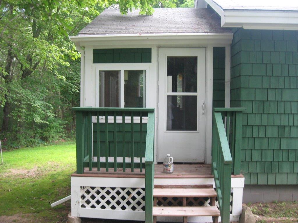50 Back Road Alfred, ME 04002 - Photo 4 of 42 4. Back - 3-Season Porch