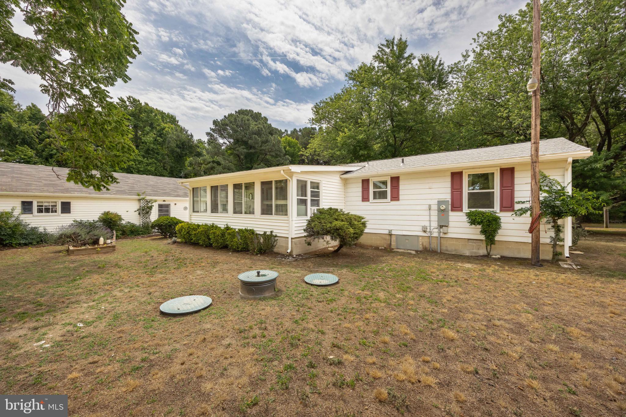 11060 Roland Parks Road Chance, MD 21821 - Photo 38 of 60 a view of a house with backyard and sitting area