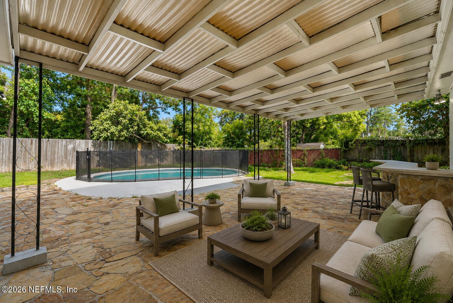 2335 Brest Road Jacksonville, FL 32216 - Photo 20 of 25 20_Coverded Stone Patio - Virtually Stag