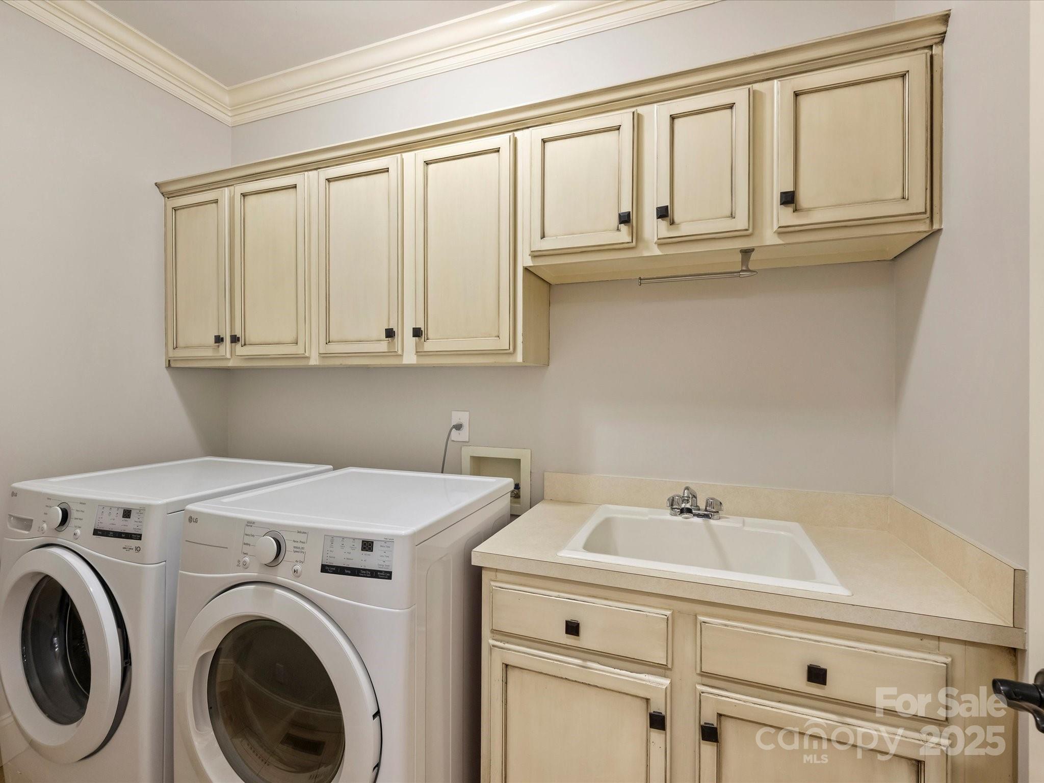 1738 Bardstown Road Charlotte, NC 28226 - Photo 22 of 40 a view of white cabinets and sink