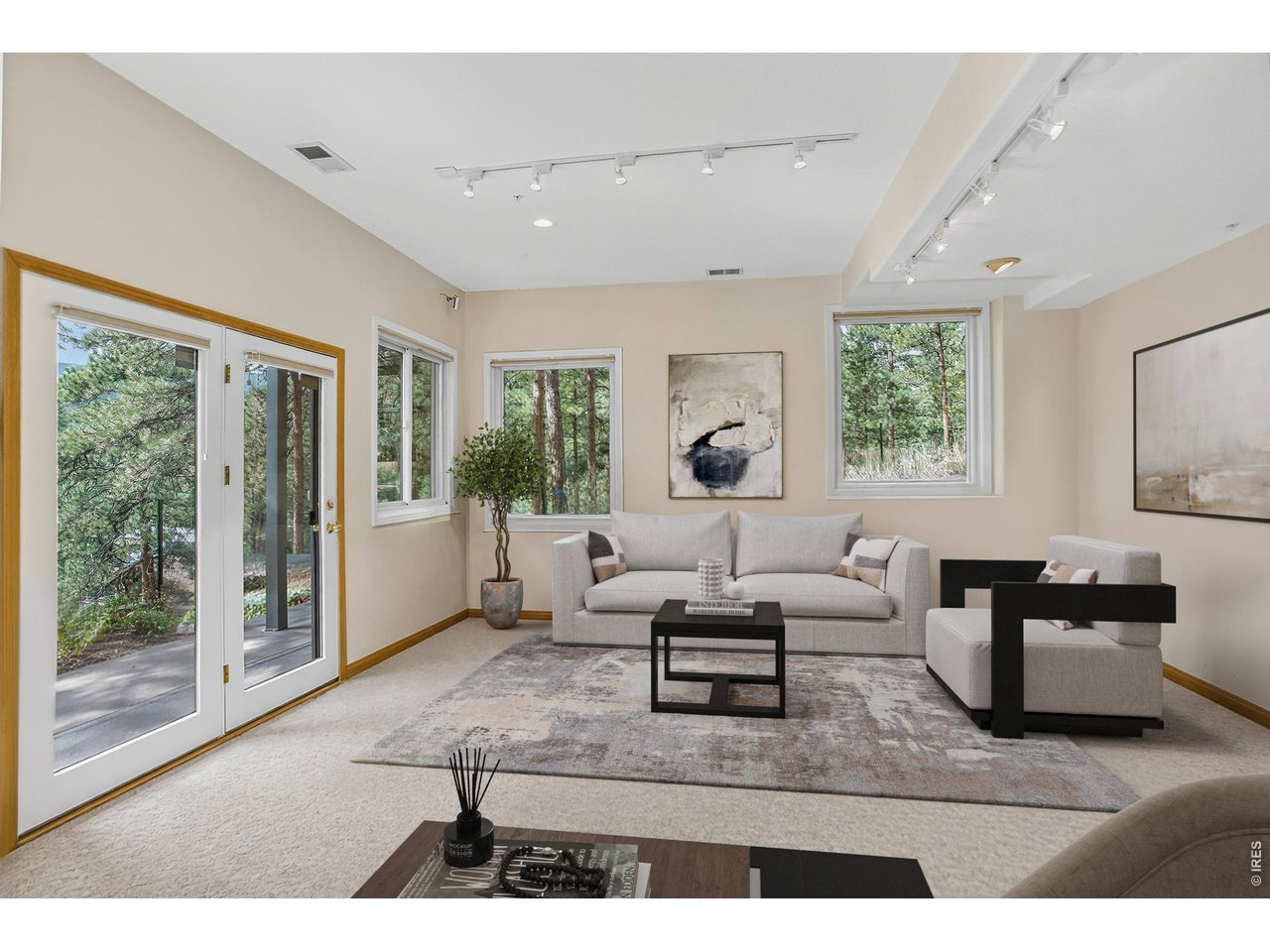 65 Betasso Road Boulder, CO 80302 - Photo 32 of 38 a living room with furniture and a large window