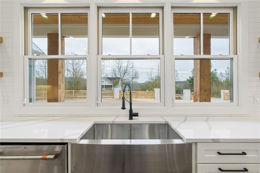 555 Lower Birmingham Road Canton, GA 30115 - Photo 54 of 104 a kitchen sink sitting next to a window