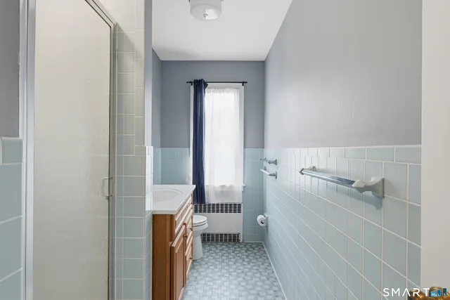 a bathroom with a sink and toilet