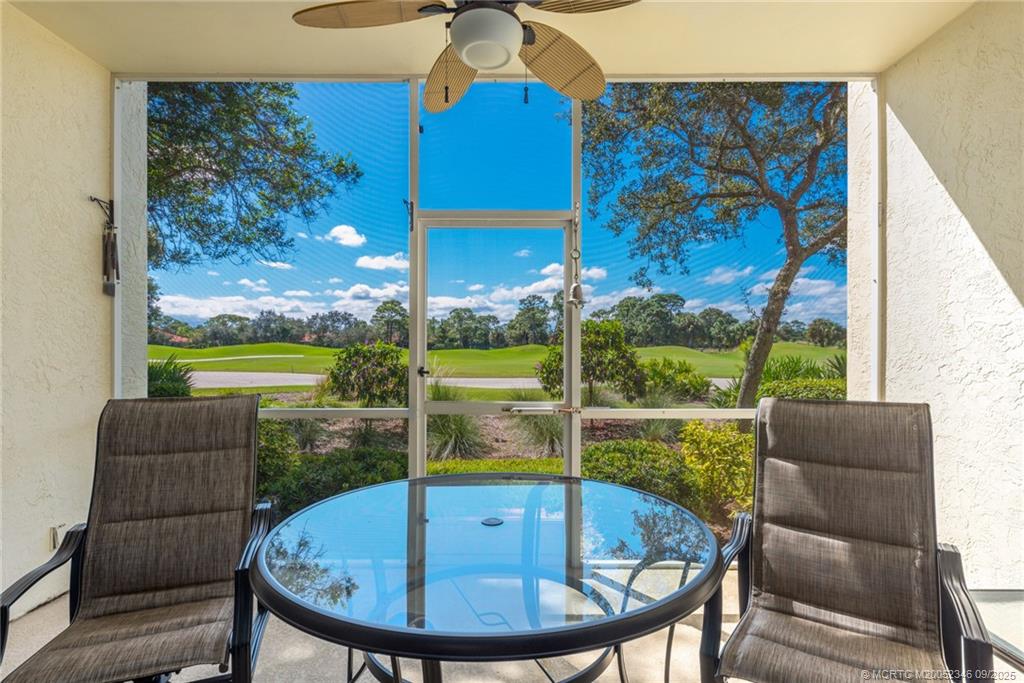 12431 Harbour Ridge Boulevard, Unit 31 Palm City, FL 34990 - Photo 4 of 12 a view of a dining room with furniture window and outside view