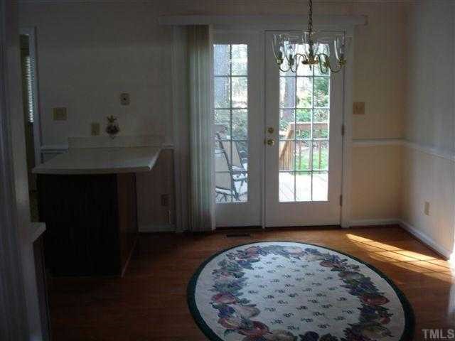 4420 Emmit Drive Raleigh, NC 27604 - Photo 6 of 6 wooden floor in an empty room with a window