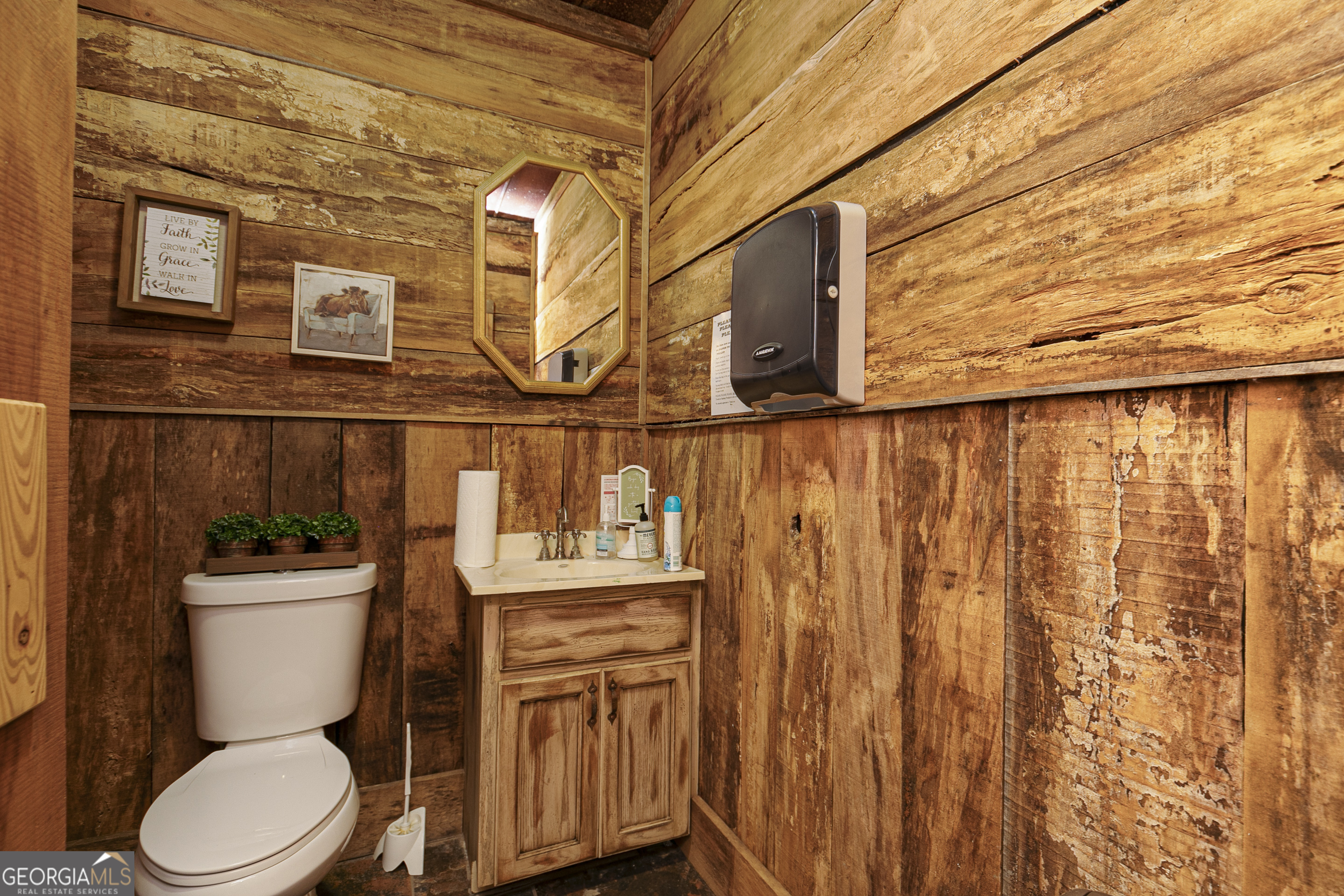 1907 Old Cedartown Road Cedartown, GA 30125 - Photo 11 of 83 a white toilet sitting next to a shower
