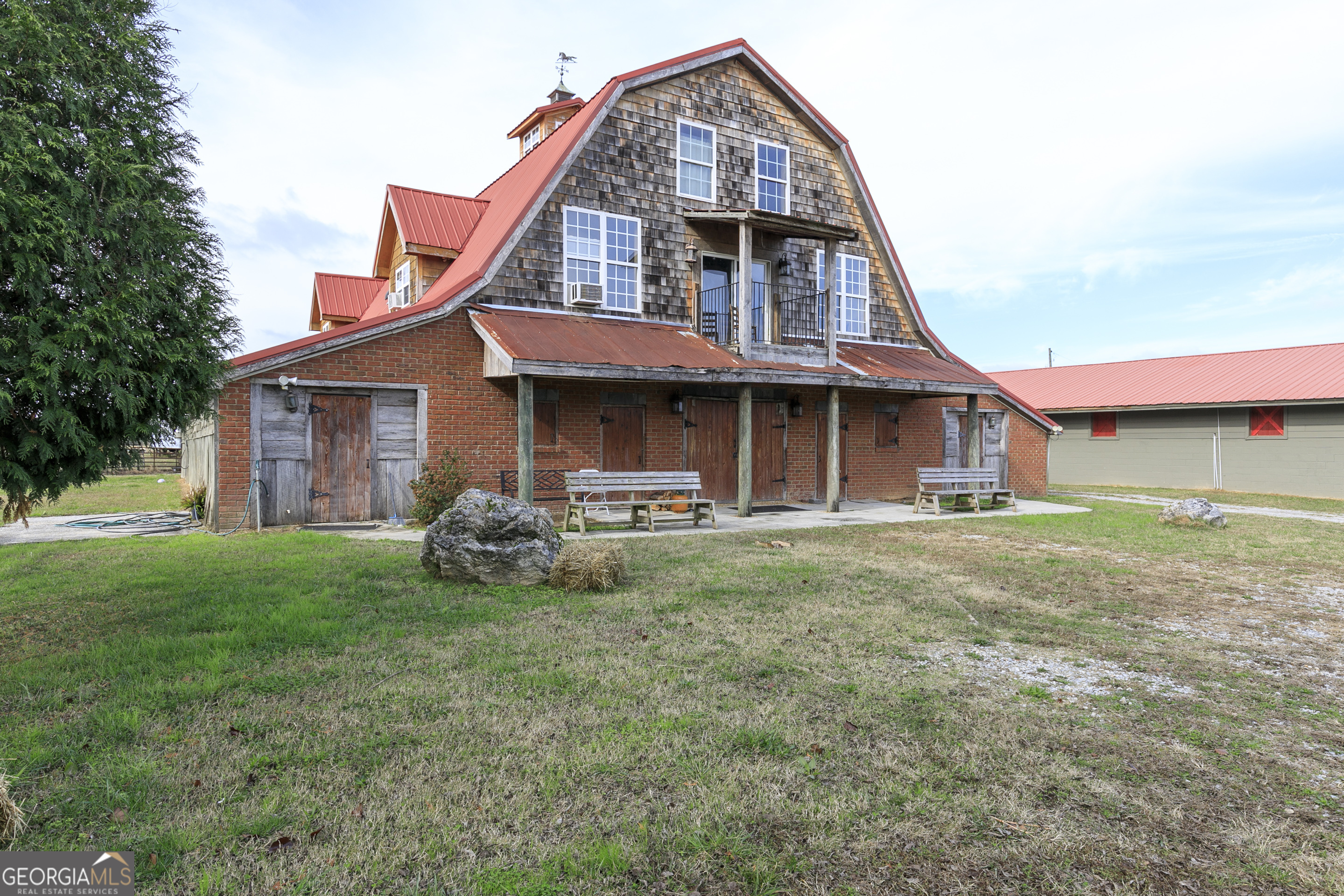 1907 Old Cedartown Road Cedartown, GA 30125 - Photo 16 of 83 a front view of a house with a garden