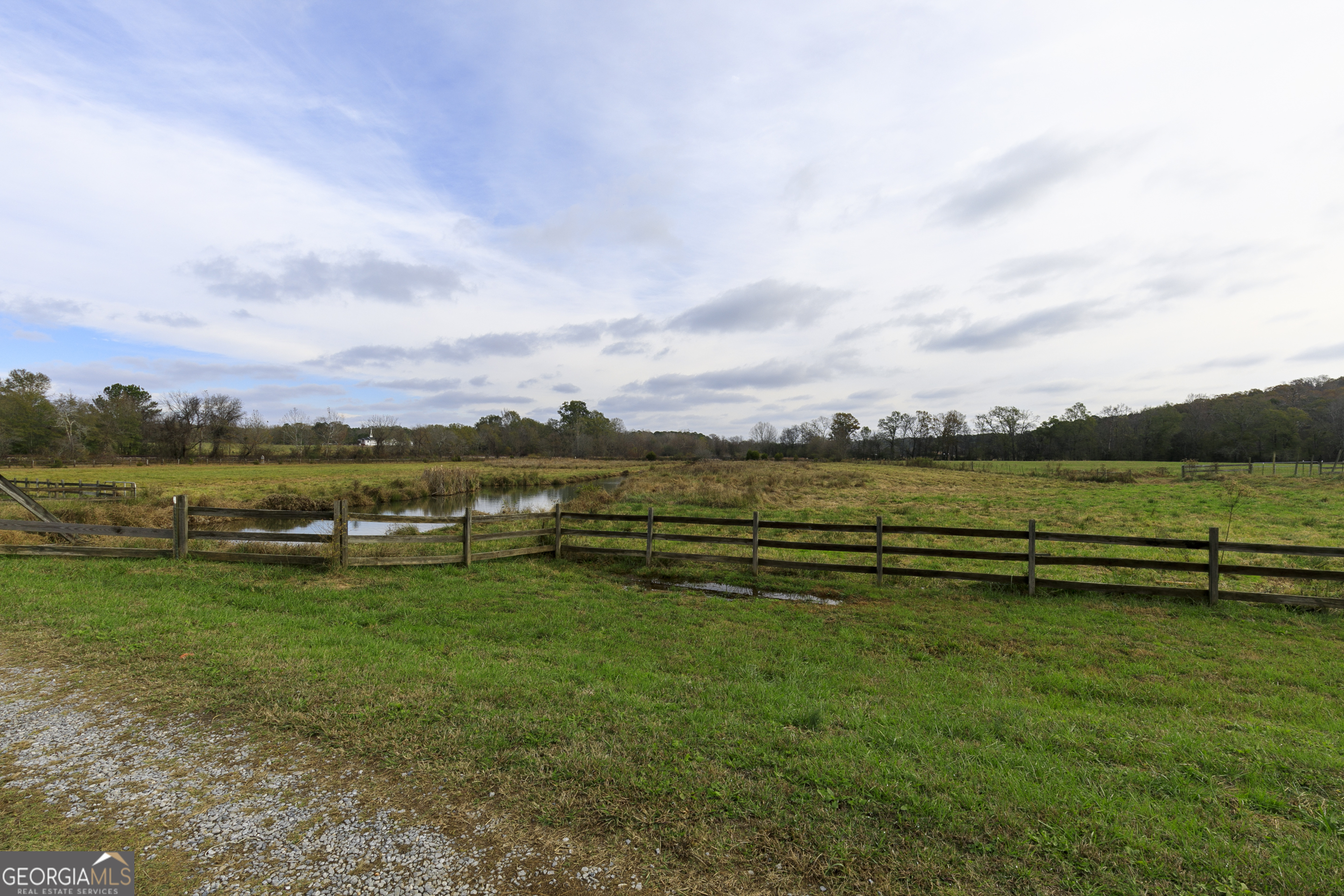 1907 Old Cedartown Road Cedartown, GA 30125 - Photo 32 of 83 a view of a lake with houses in the back