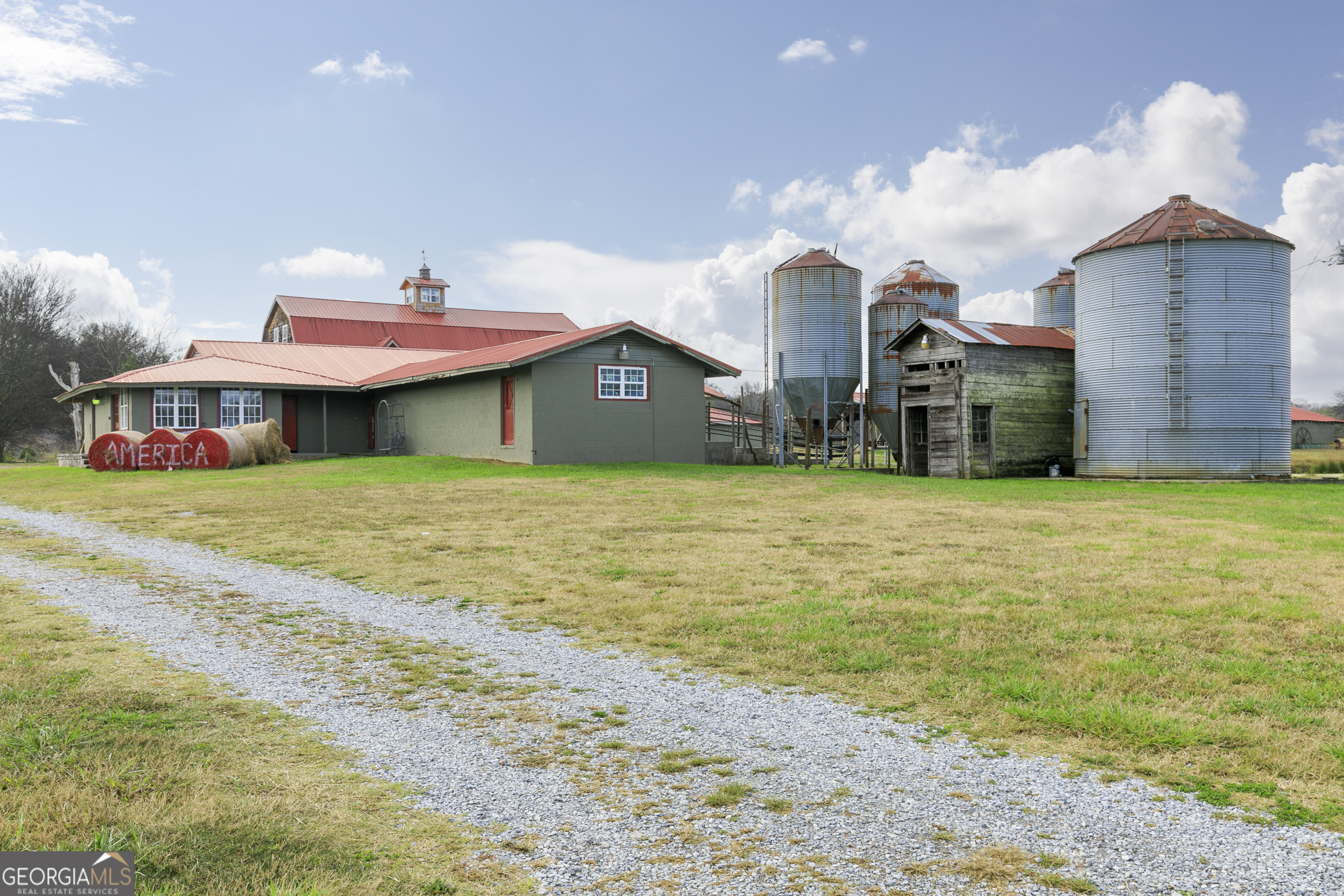 1907 Old Cedartown Road Cedartown, GA 30125 - Photo 34 of 83 a view of a house with a yard and sitting area