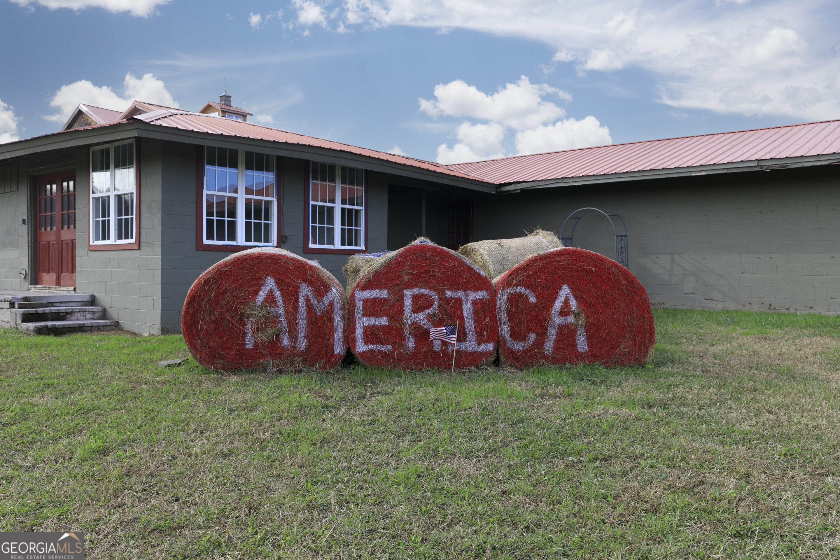 1907 Old Cedartown Road Cedartown, GA 30125 - Photo 37 of 83 a view of front of a house with yard and a fireplace