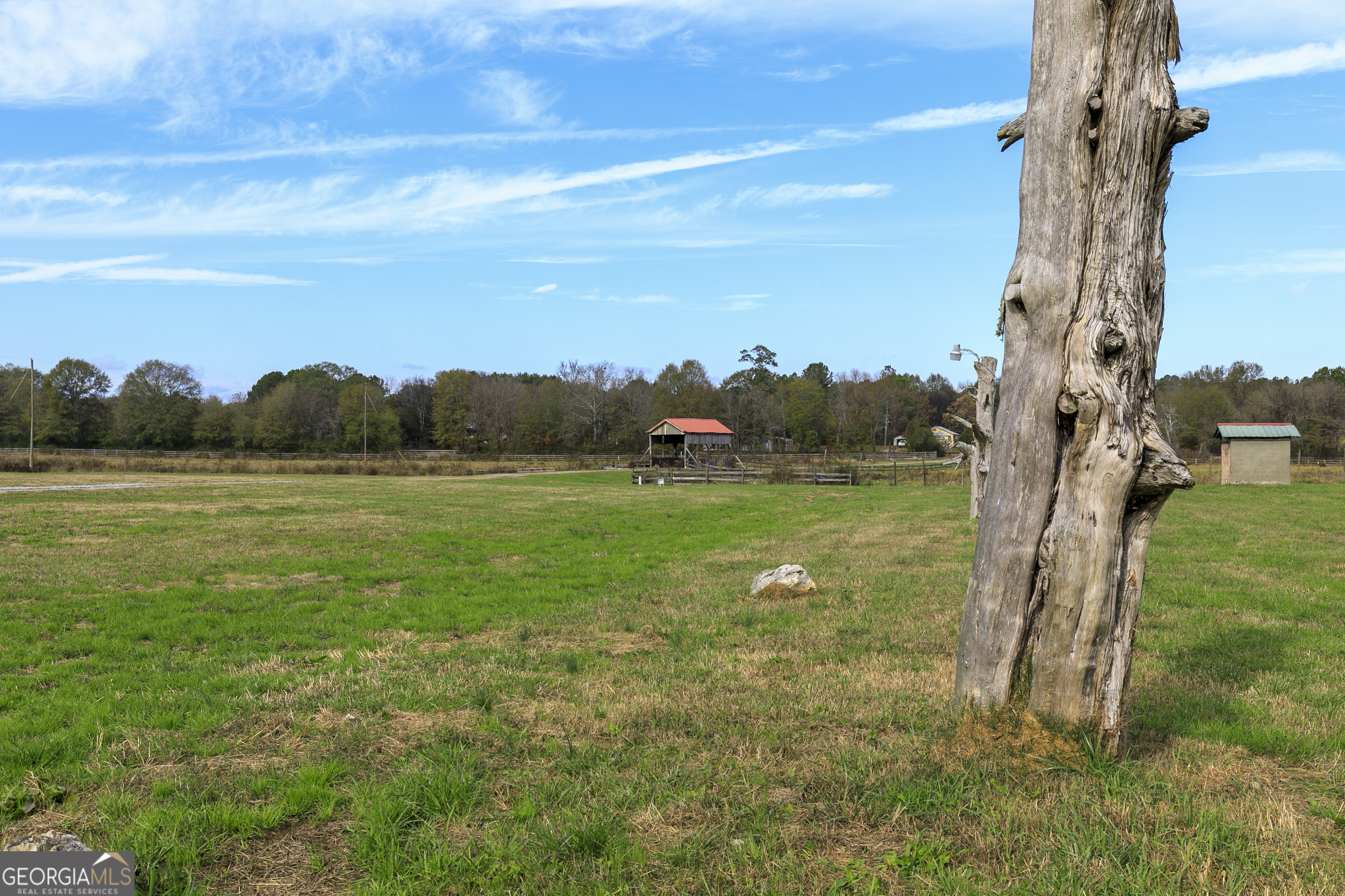 1907 Old Cedartown Road Cedartown, GA 30125 - Photo 40 of 83 a view of a field with sitting area and a lake view