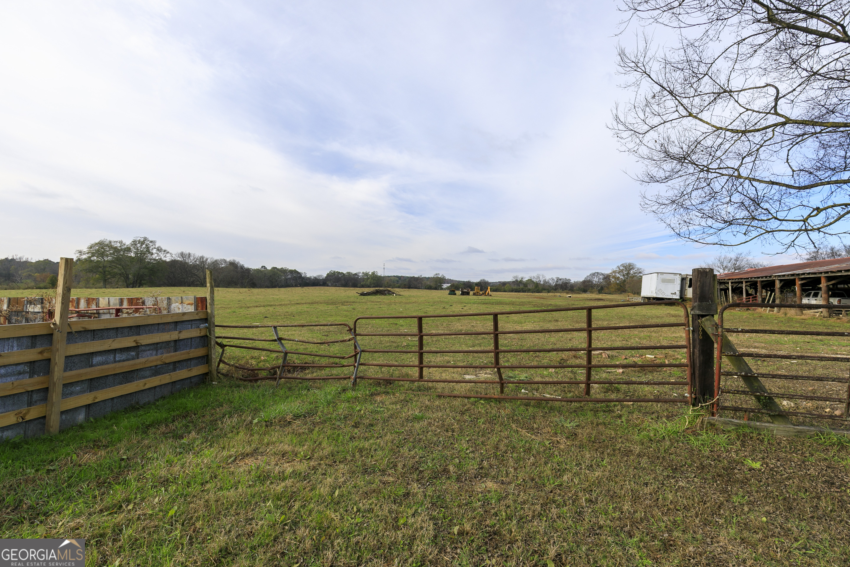 1907 Old Cedartown Road Cedartown, GA 30125 - Photo 45 of 83 a view of a pathway with a bench in front of it
