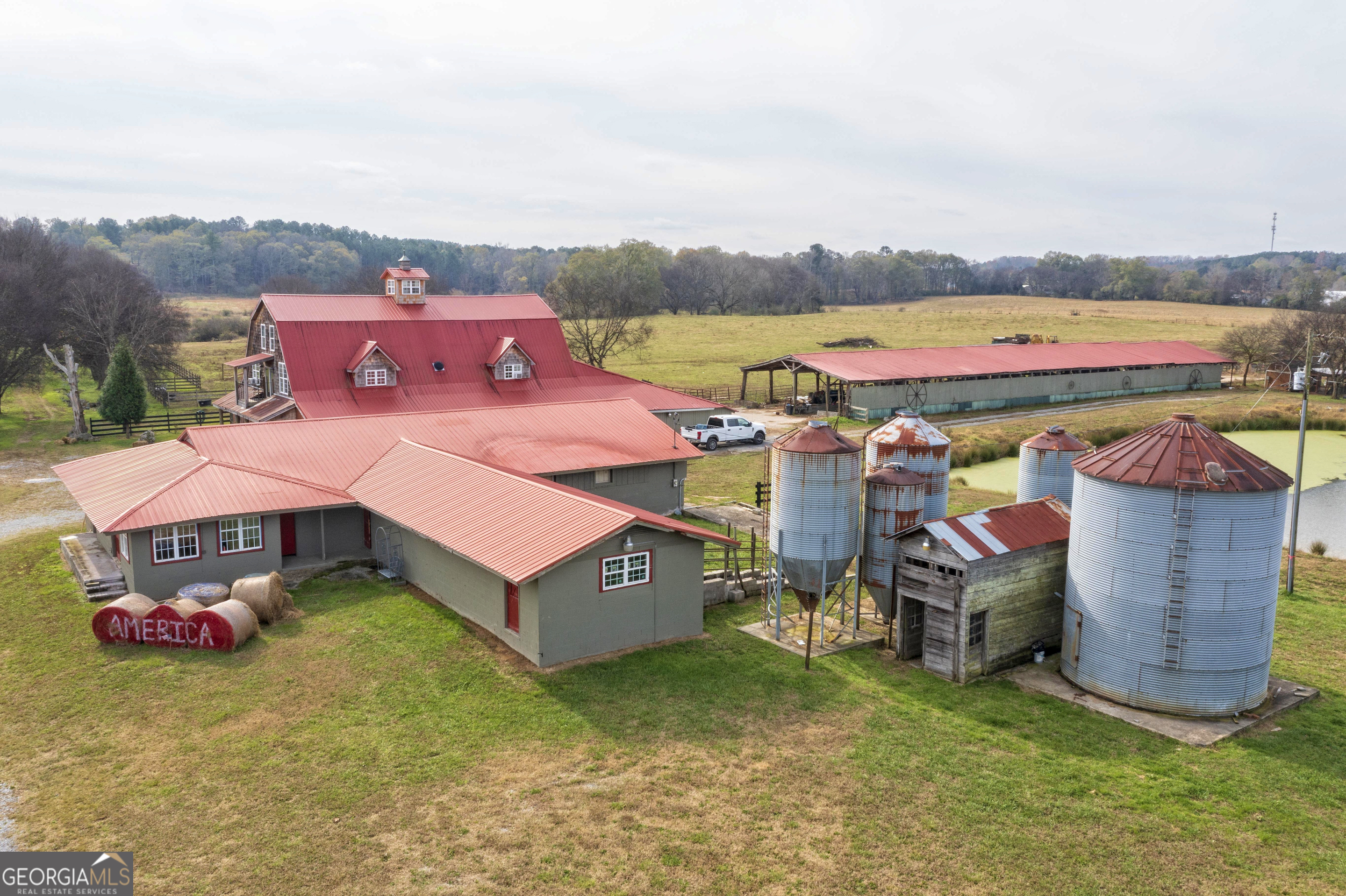 1907 Old Cedartown Road Cedartown, GA 30125 - Photo 81 of 83 an aerial view of a house with a garden and lake view