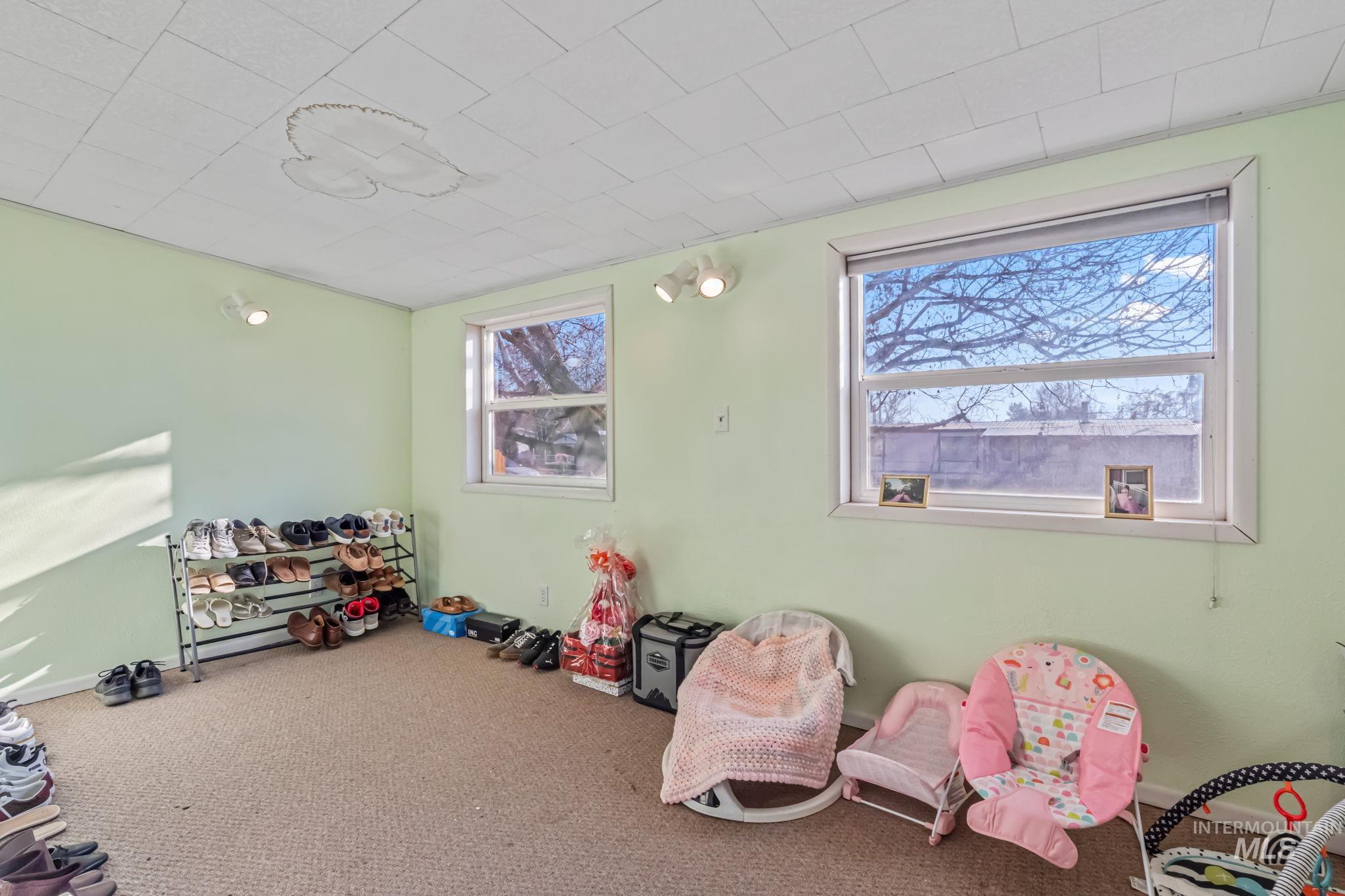 11234 George Street Nampa, ID 83651 - Photo 16 of 25 Playroom with carpet and baseboards
