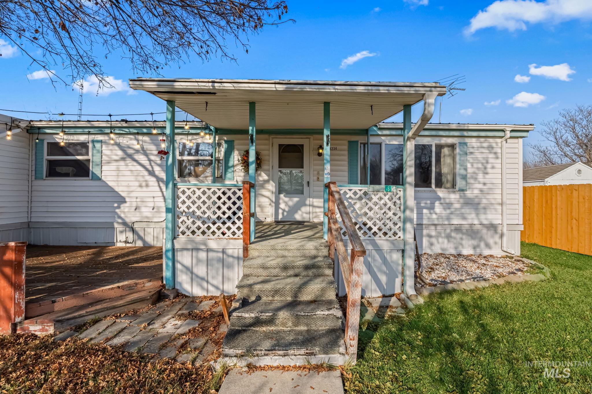 11234 George Street Nampa, ID 83651 - Photo 5 of 25 View of front of home featuring a porch