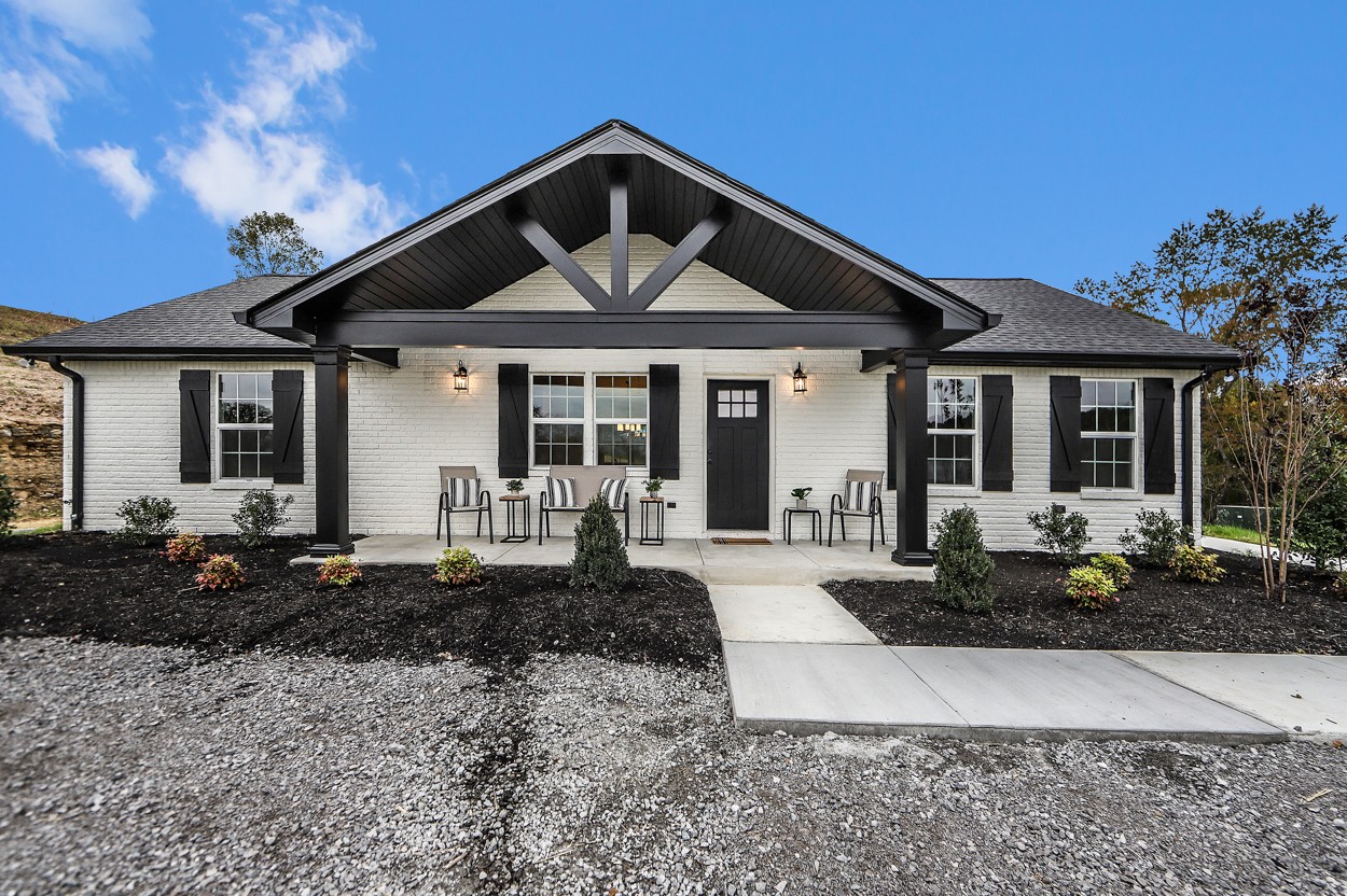 25 Riadon Road Hartsville, TN 37074 - Photo 1 of 19 a front view of a house with a porch