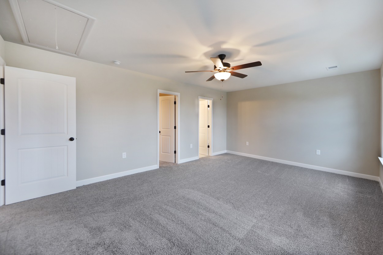 25 Riadon Road Hartsville, TN 37074 - Photo 12 of 19 a view of an empty room with a ceiling fan