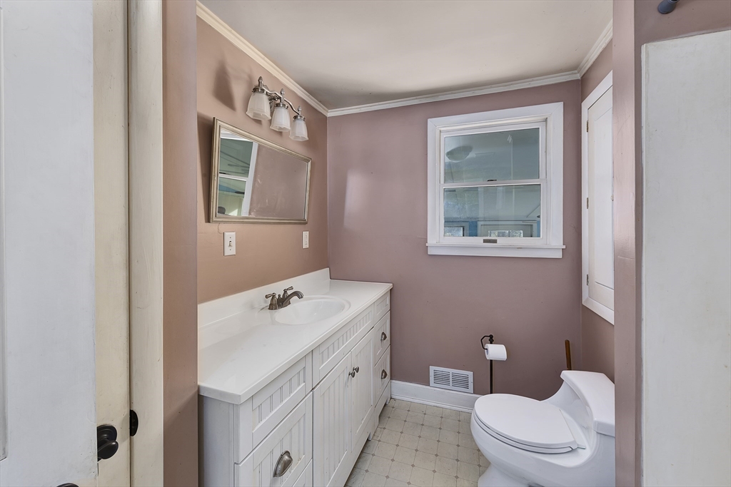 16 Killam Hill Road Boxford, MA 01921 - Photo 12 of 34 a bathroom with a toilet sink and mirror