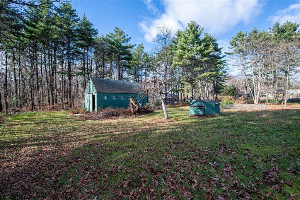 16 Killam Hill Road Boxford, MA 01921 - Photo 17 of 34 a backyard of a house with lots of green space