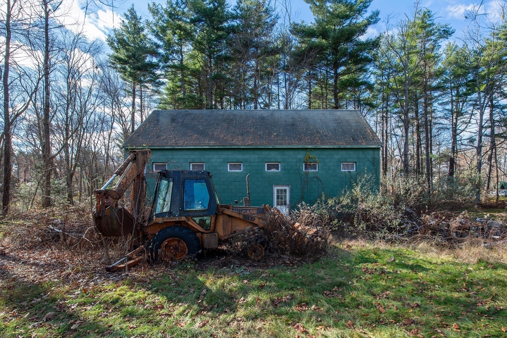 16 Killam Hill Road Boxford, MA 01921 - Photo 18 of 34 a backyard of a house with lots of green space