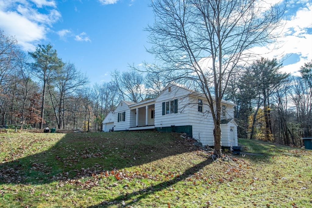 16 Killam Hill Road Boxford, MA 01921 - Photo 31 of 34 a view of a yard with a large tree