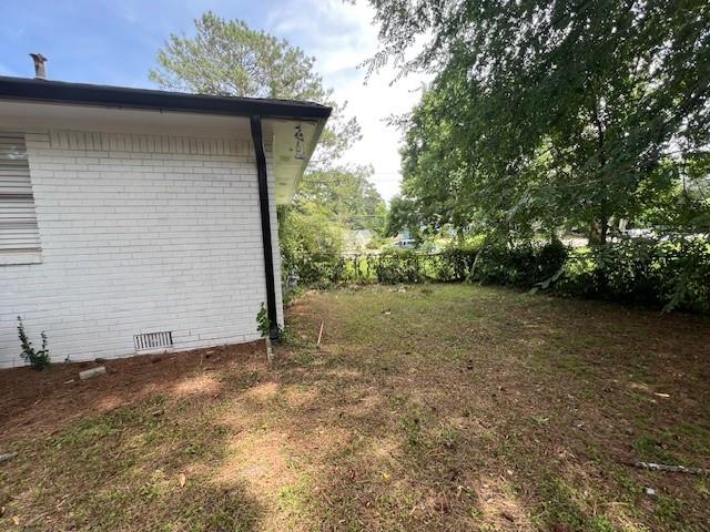 6935 Fielder Road Rex, GA 30273 - Photo 20 of 22 a view of a house with a yard