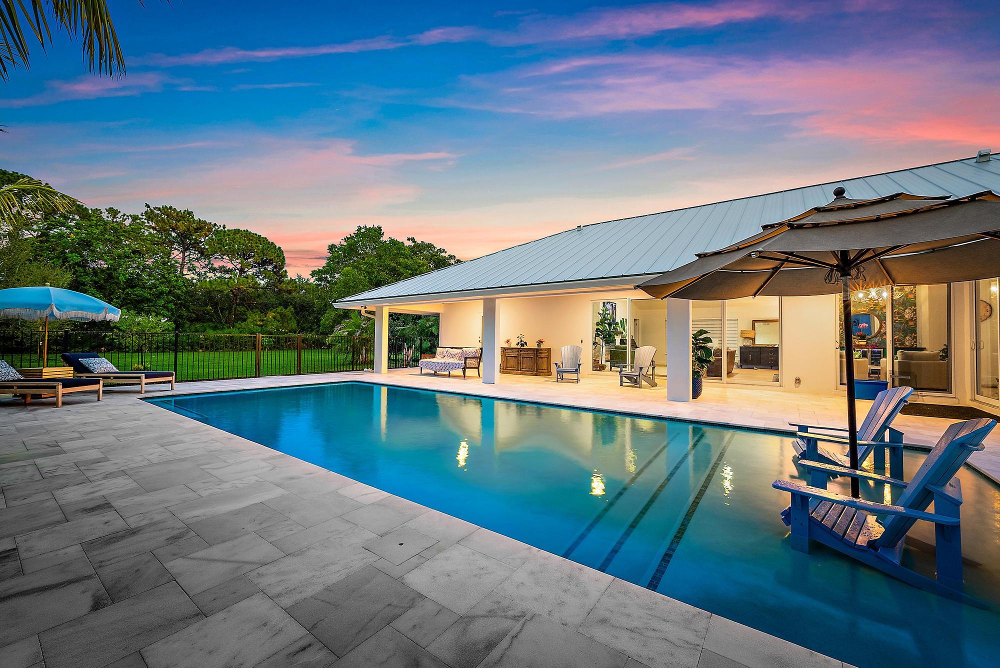 6799 Imperial Woods Road Jupiter, FL 33458 - Photo 25 of 51 Pool & Back Exterior