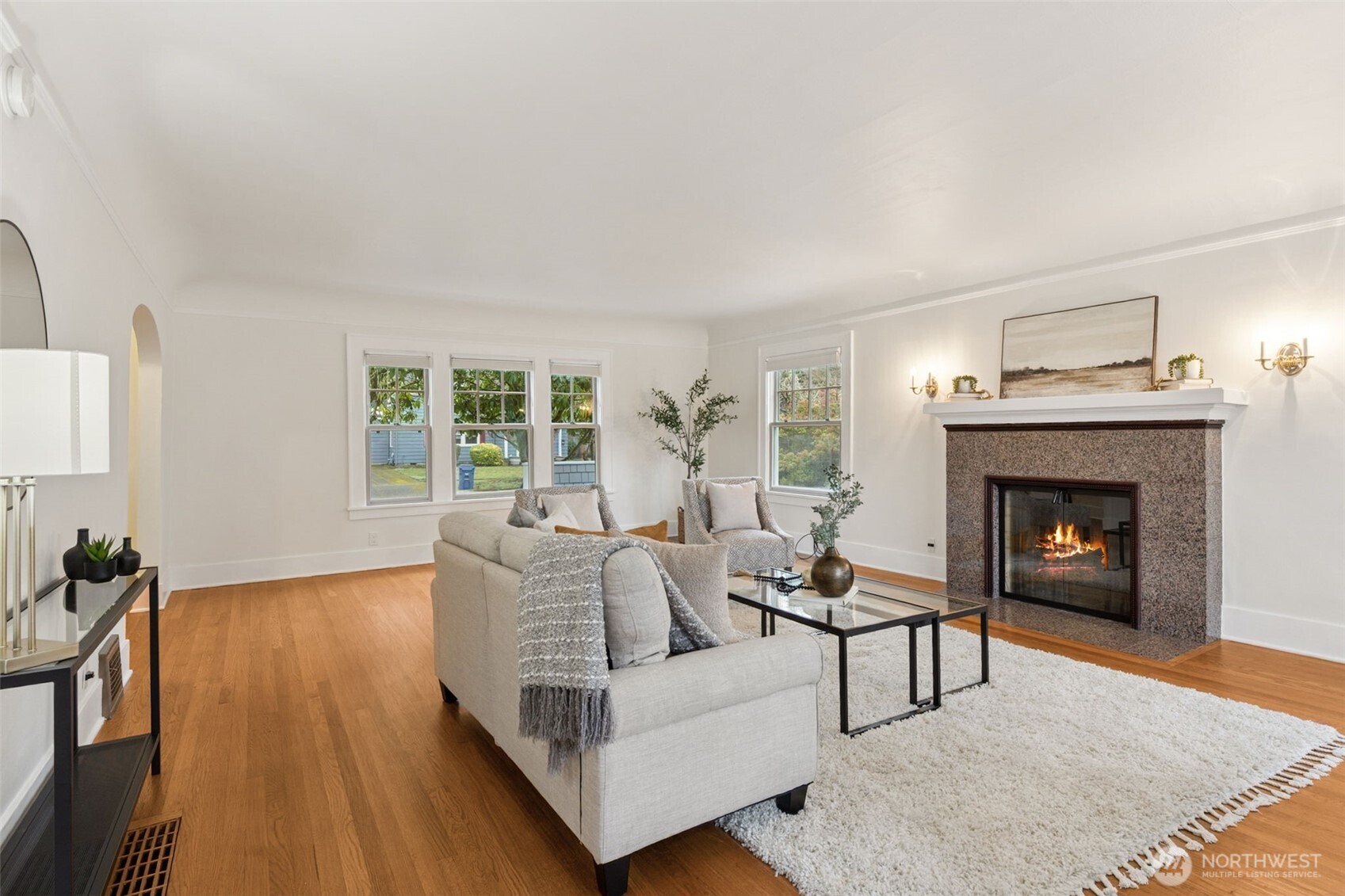 2305 Columbia Street Southwest Olympia, WA 98501 - Photo 11 of 34 a living room with furniture and a fireplace