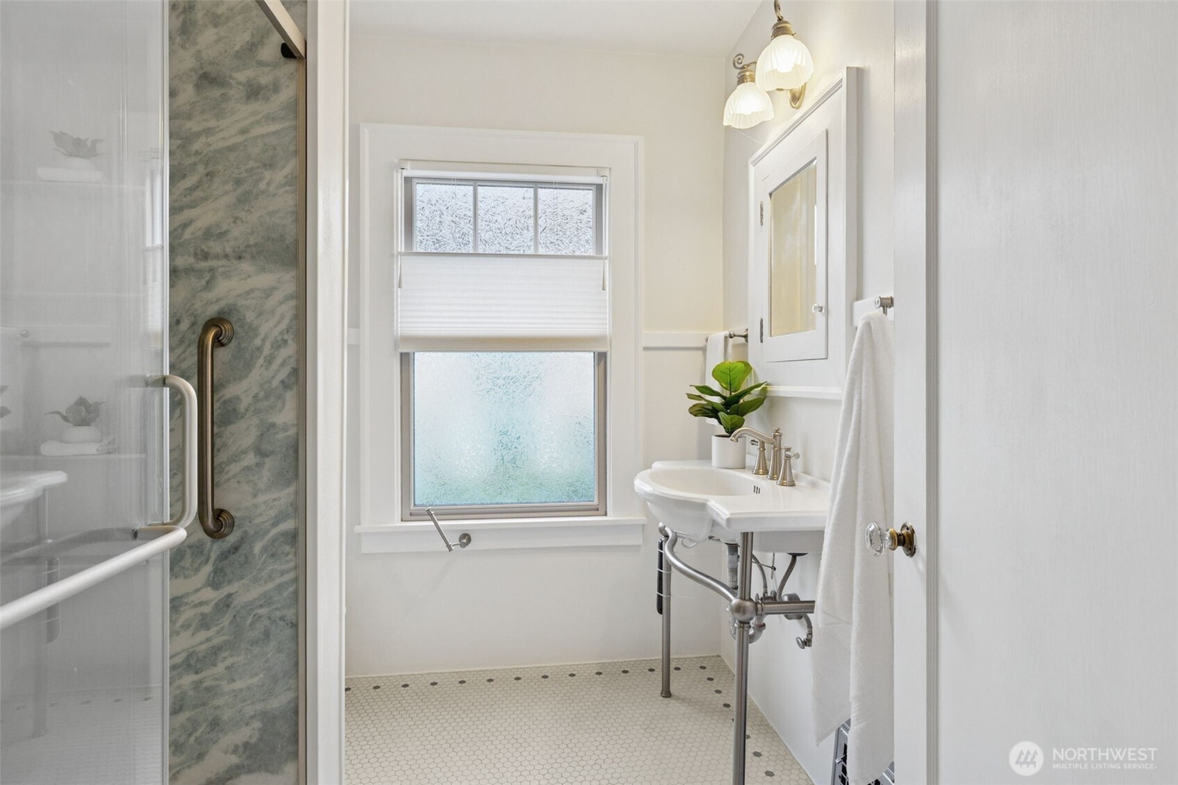 2305 Columbia Street Southwest Olympia, WA 98501 - Photo 17 of 34 a room that has a window and a table in it