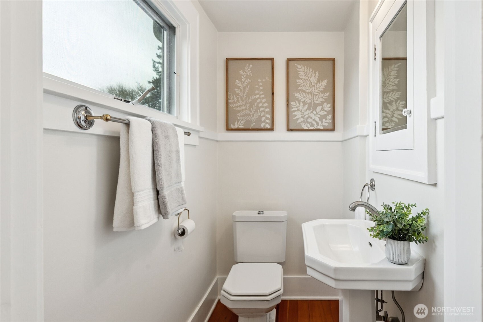 2305 Columbia Street Southwest Olympia, WA 98501 - Photo 22 of 34 a bathroom with a toilet sink and a window