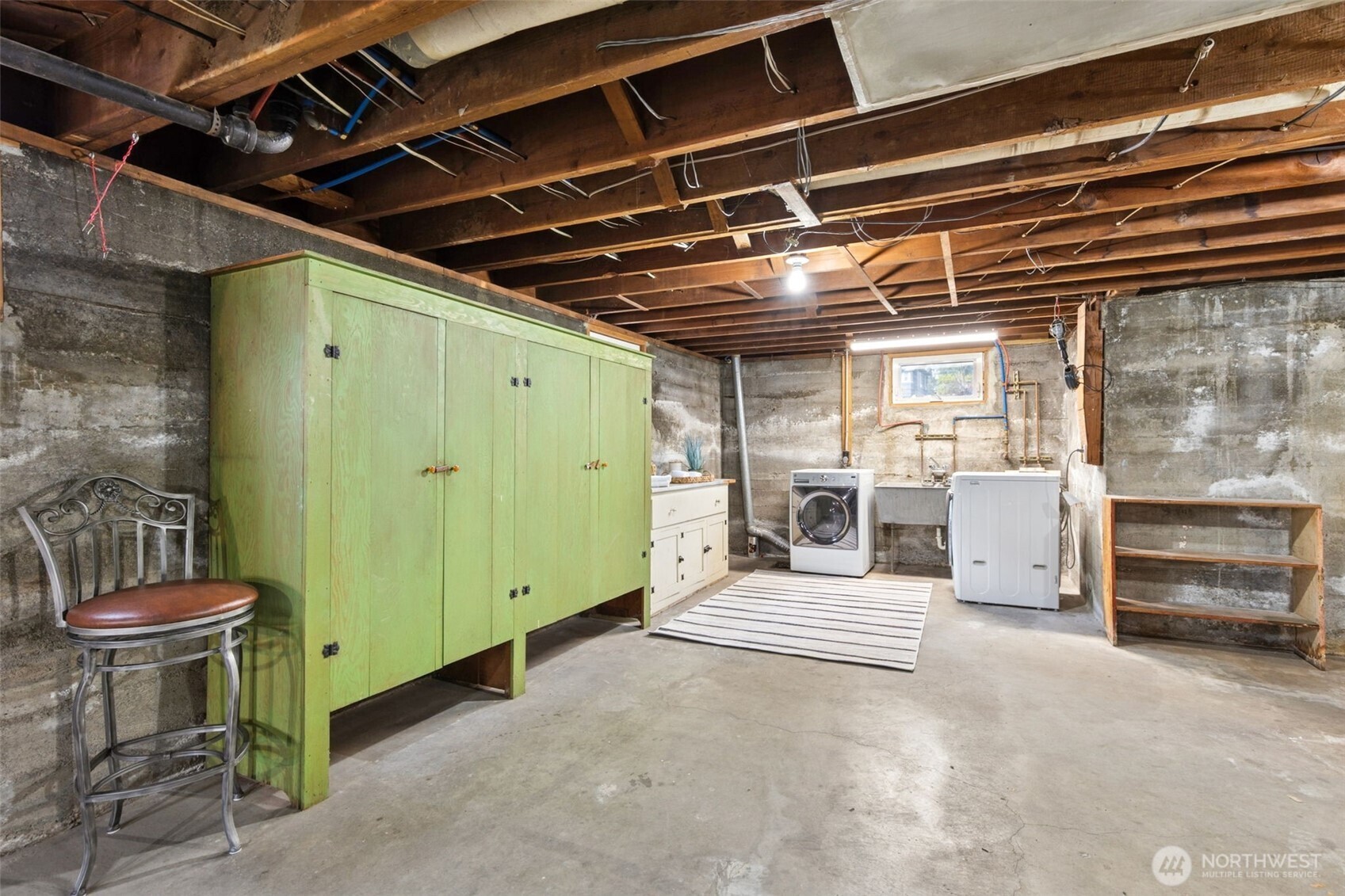 2305 Columbia Street Southwest Olympia, WA 98501 - Photo 23 of 34 a view of a chair and table in a room