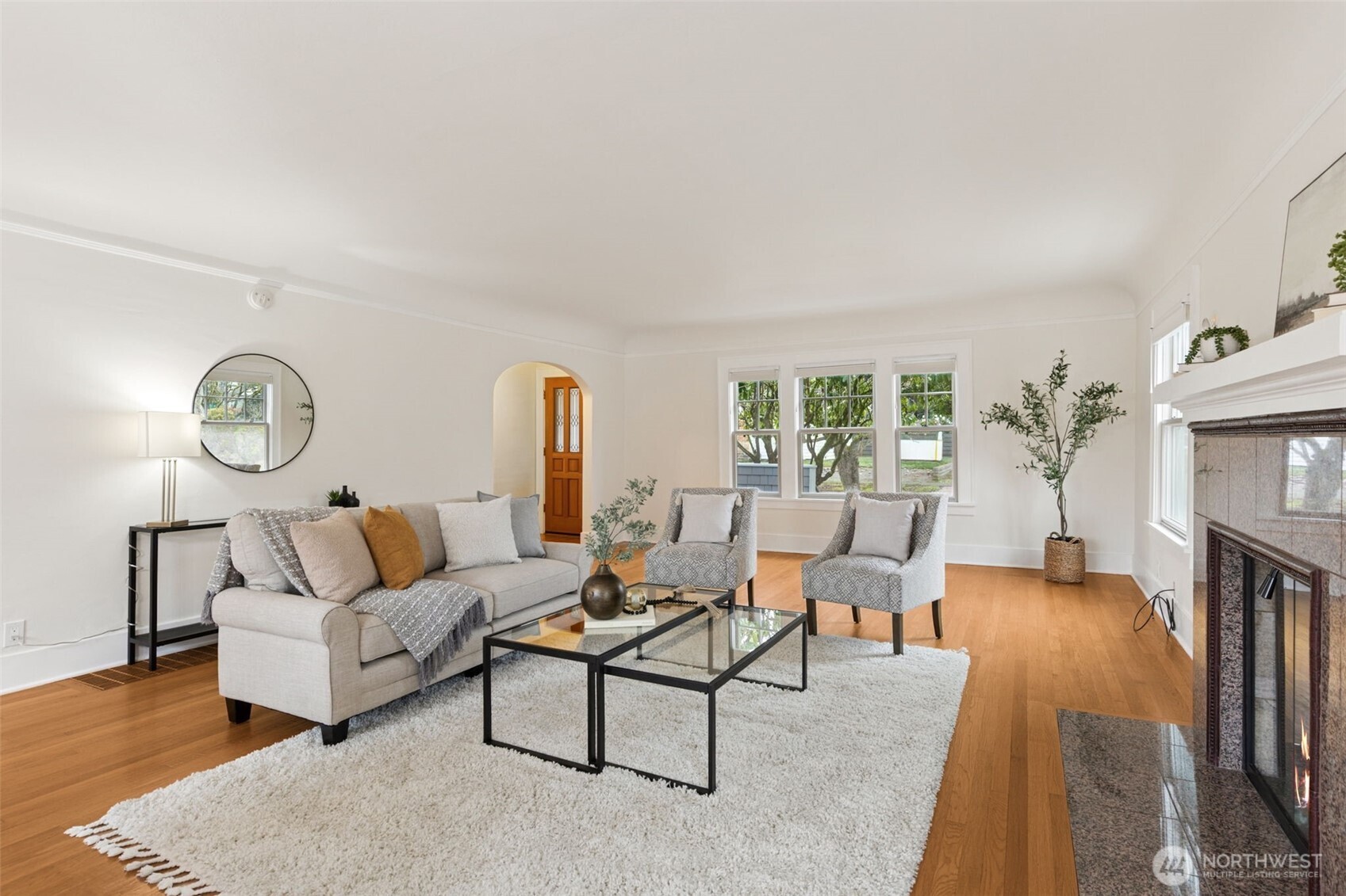 2305 Columbia Street Southwest Olympia, WA 98501 - Photo 9 of 34 a living room with furniture dining table and a fireplace