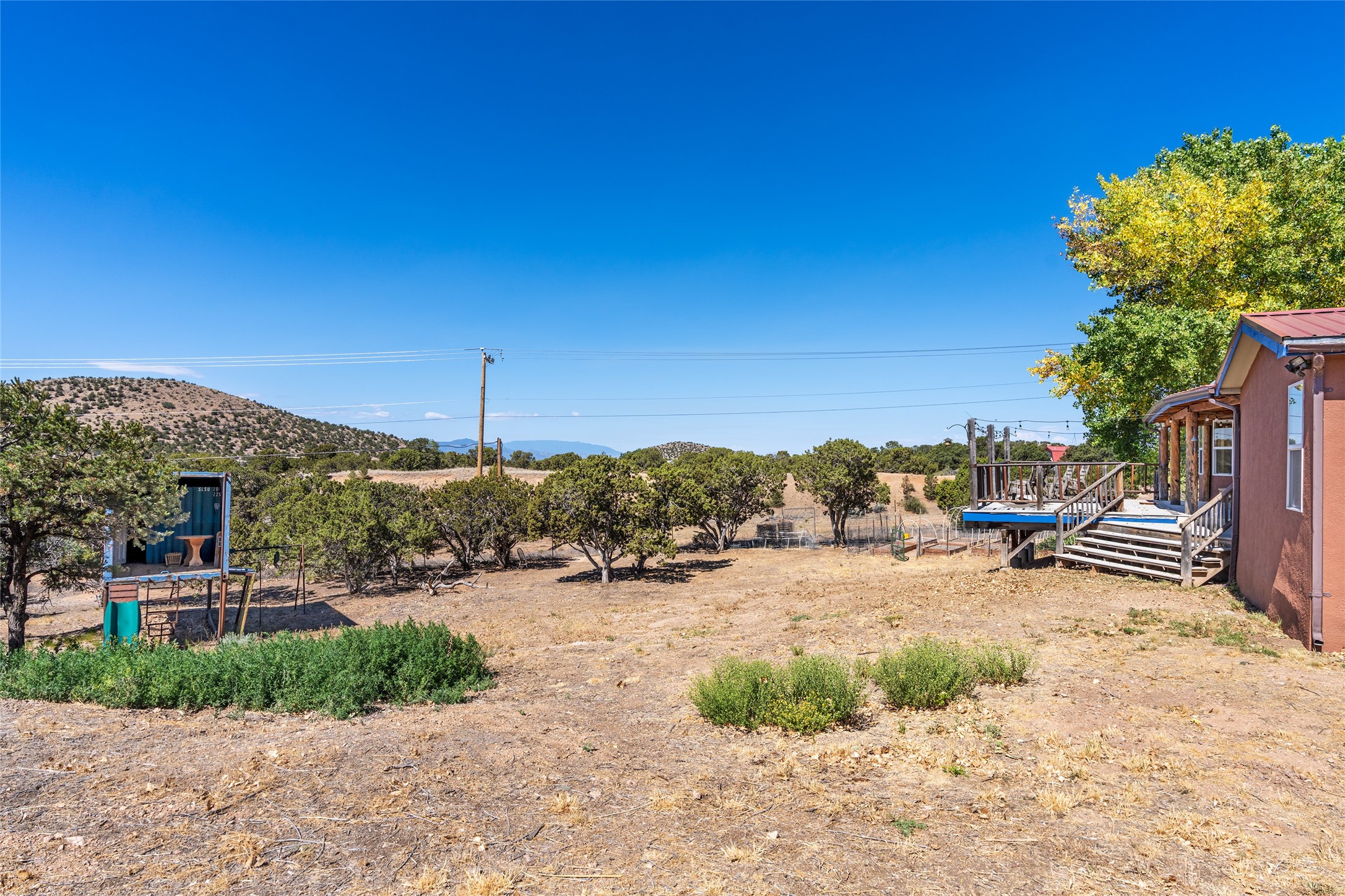 12 Apache Ridge Road Santa Fe, NM 87505 - Photo 49 of 69 back area w/playhouse