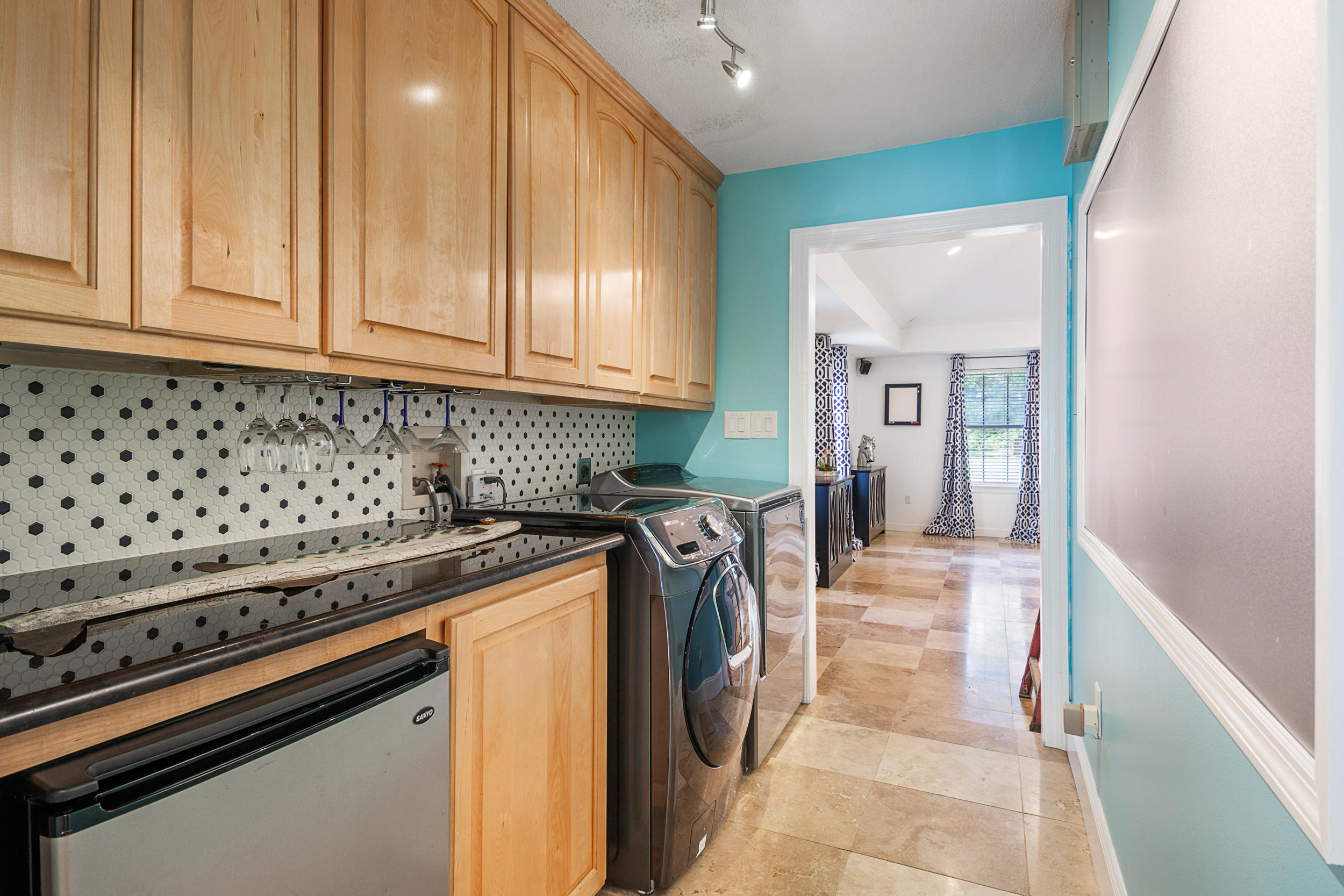 5975 Jack Stokes Road Baker, FL 32531 - Photo 20 of 44 a utility room with dryer and washer