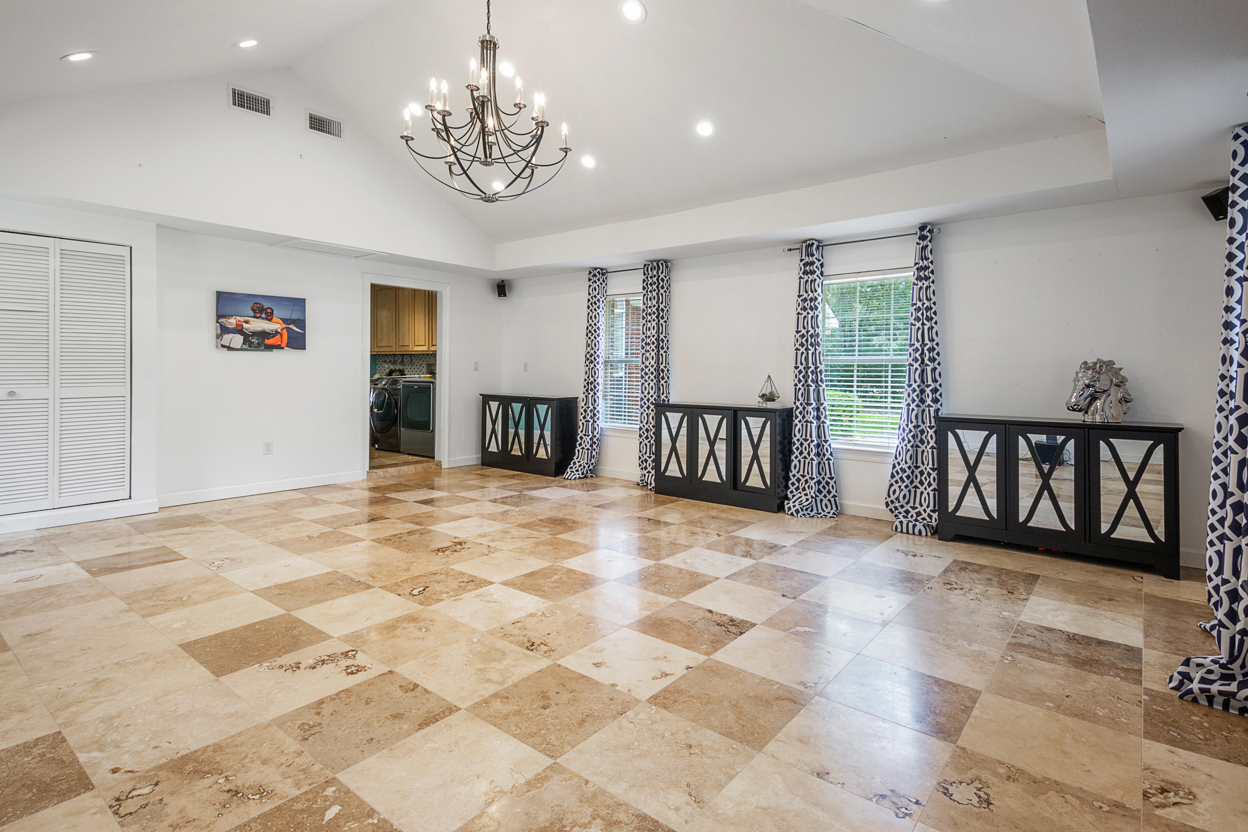 5975 Jack Stokes Road Baker, FL 32531 - Photo 21 of 44 a view of a livingroom with a dinning space & balcony