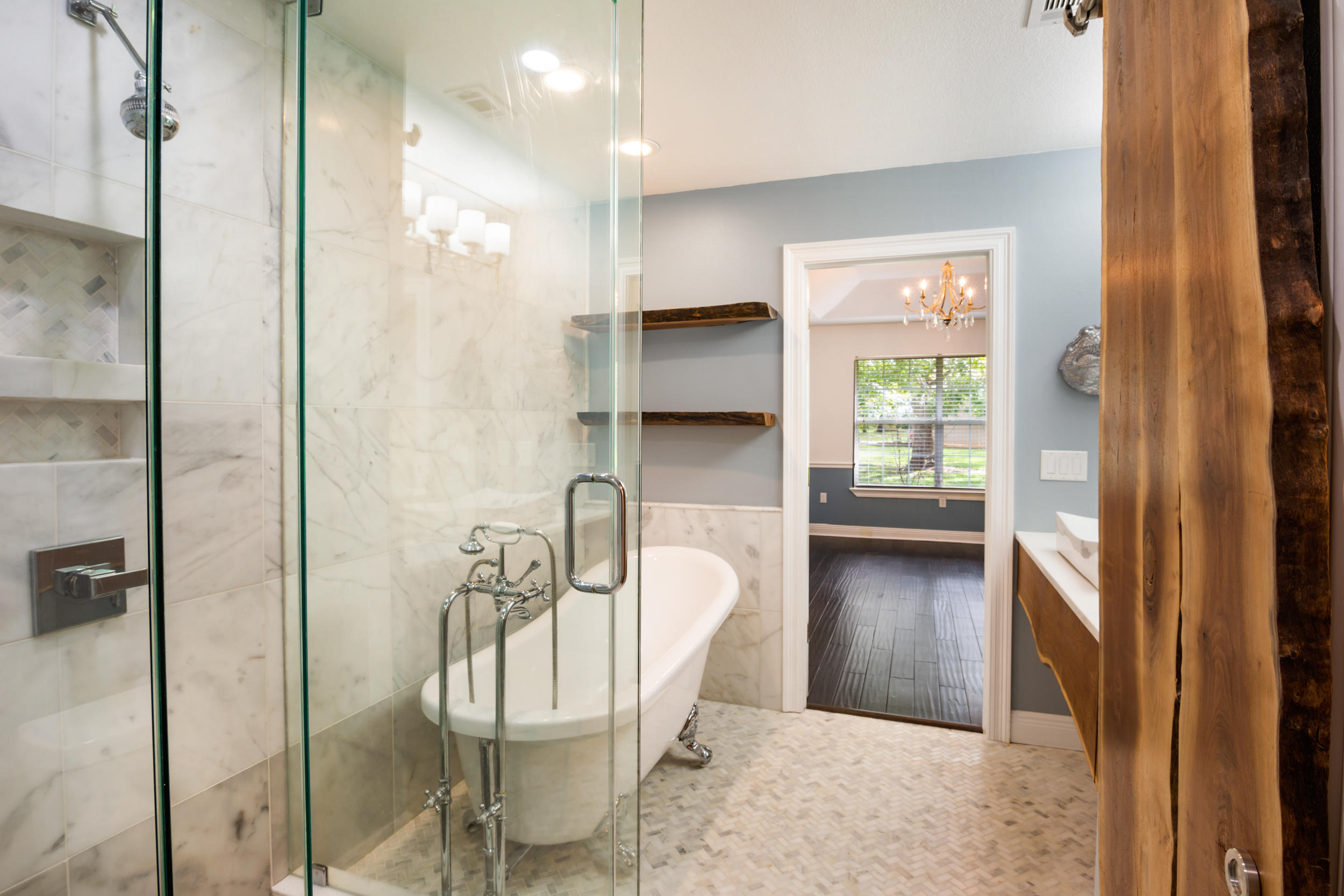 5975 Jack Stokes Road Baker, FL 32531 - Photo 27 of 44 a view of a walk in closet and bathroom