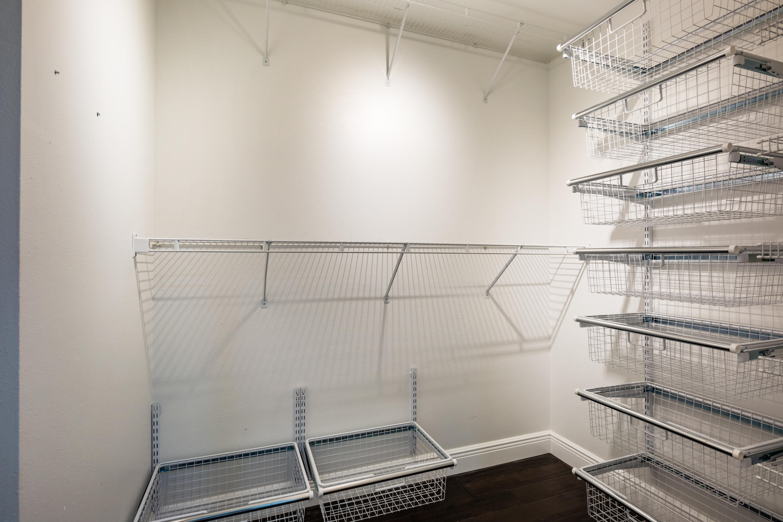 5975 Jack Stokes Road Baker, FL 32531 - Photo 28 of 44 a room with utility racks on the wall