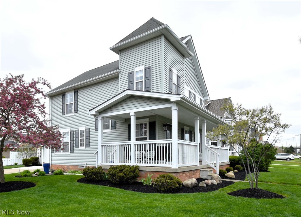 23825 Rockside Road Bedford, OH 44146 - Photo 2 of 22 View of front of property with a front lawn and a porch