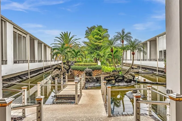 a view of a chairs and table in a patio