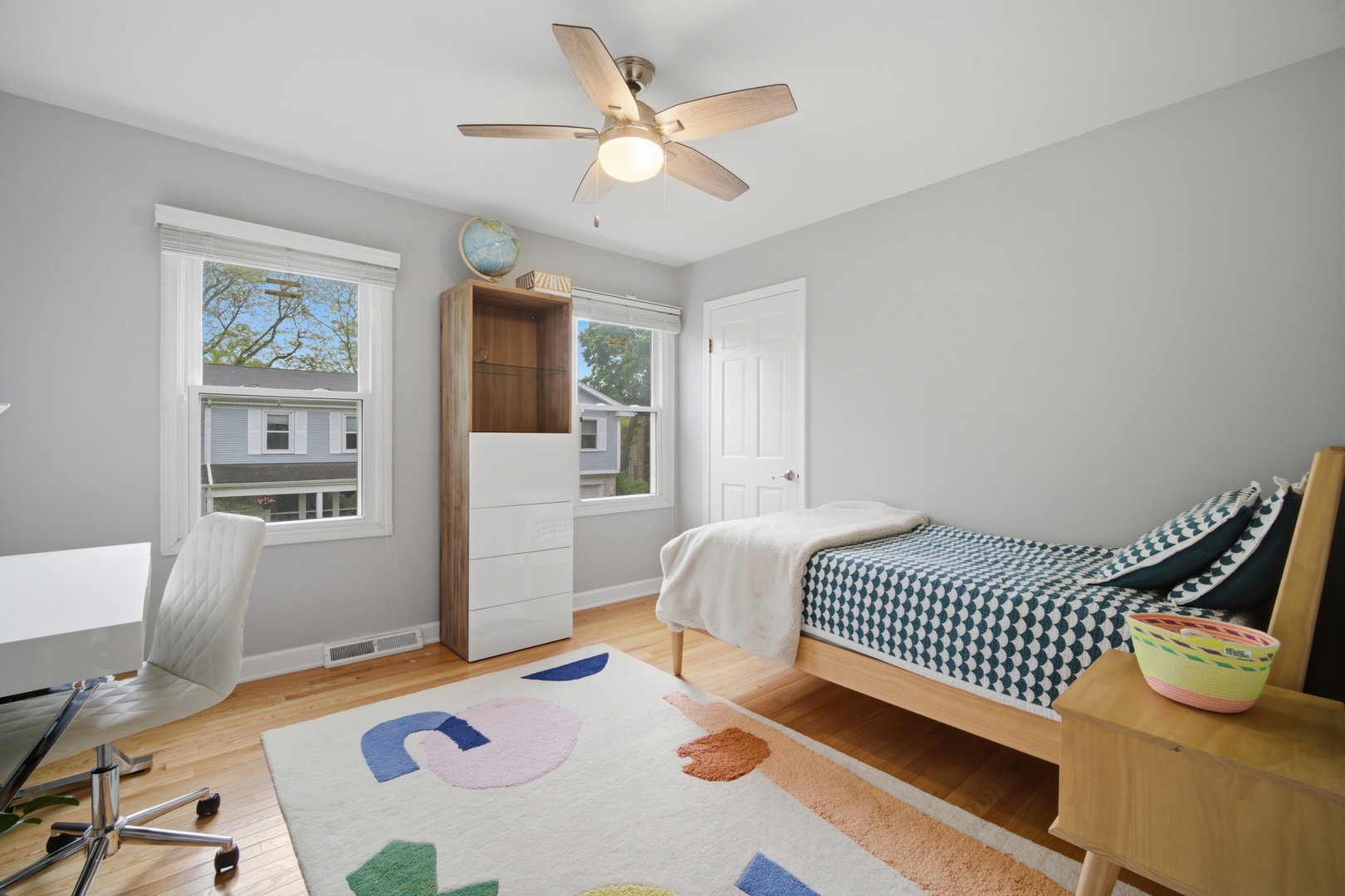 2831 Farmington Road Northbrook, IL 60062 - Photo 22 of 33 a bedroom with a bed and a chandelier
