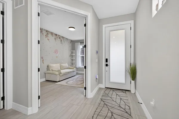 a bathroom with a tub and shower