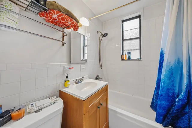 a bathroom with a sink and a bathtub