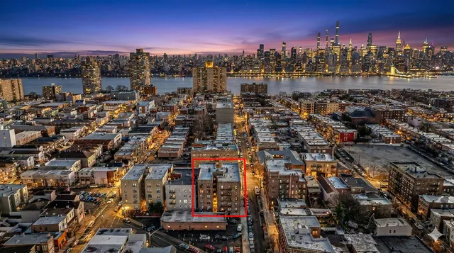 an aerial view of a building with a outdoor space