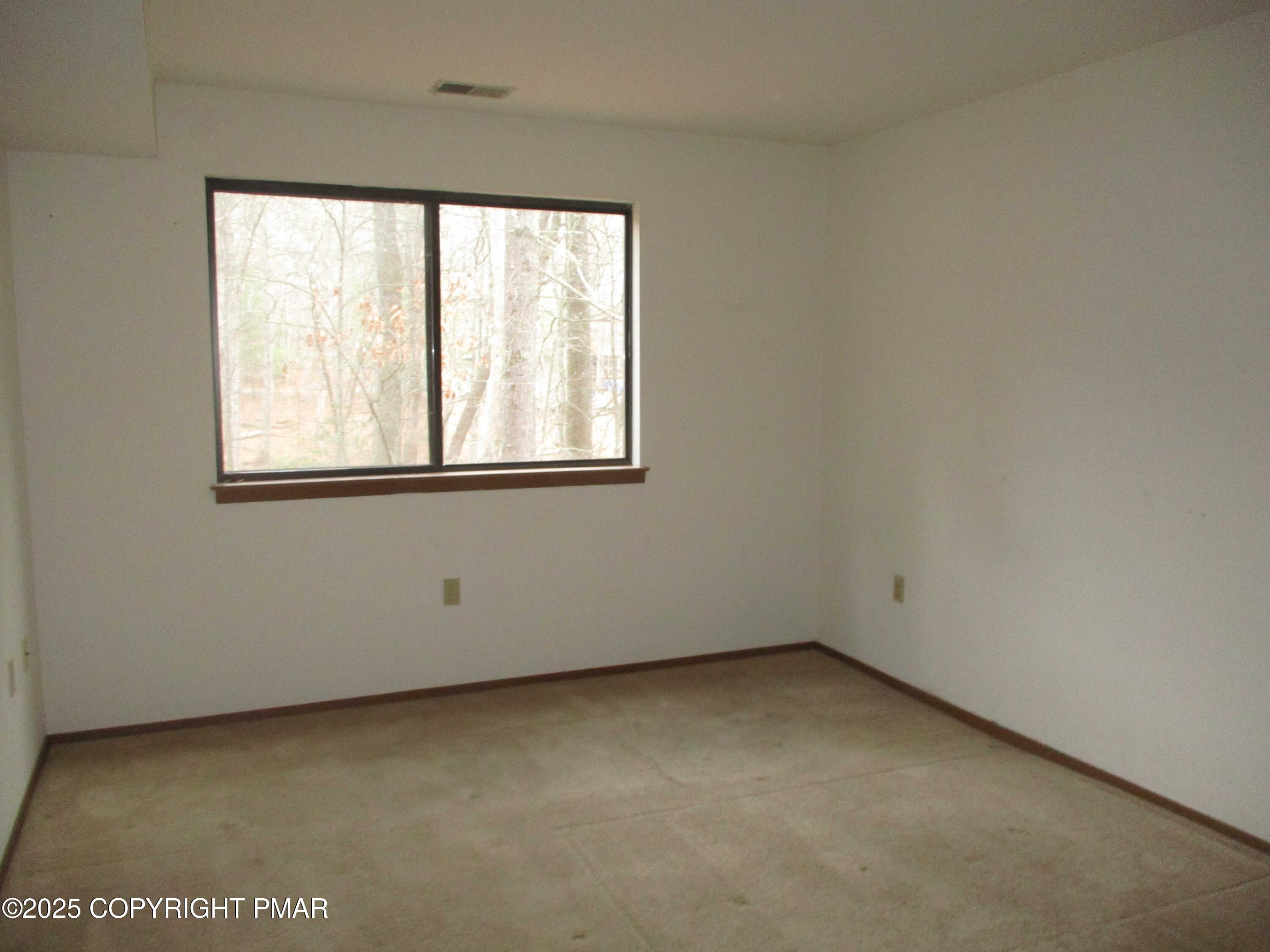 159 Stream Court Bushkill, PA 18324 - Photo 13 of 26 an empty room with a window